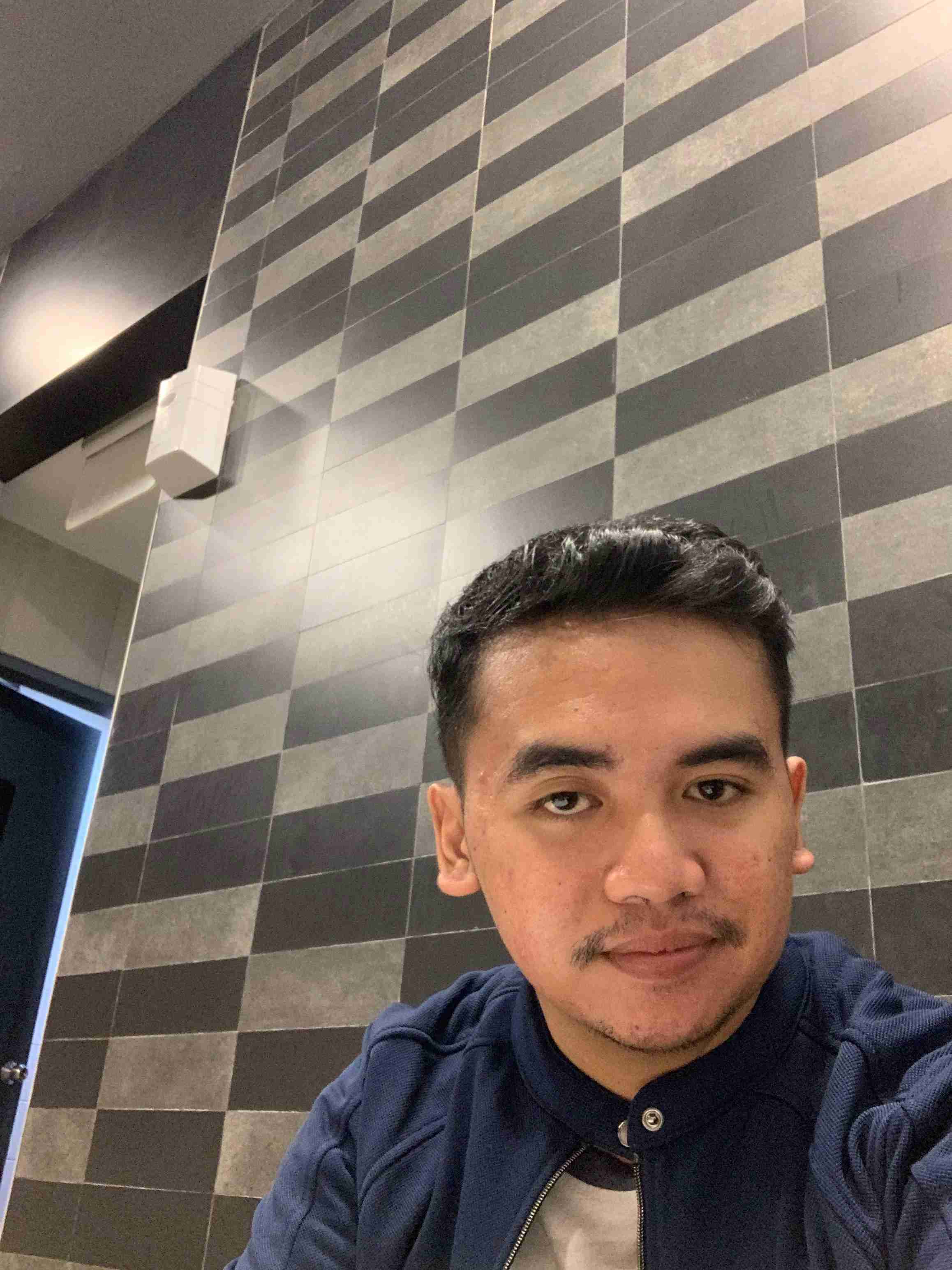 Ilham Hasan